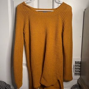 Yellow sweater with cut outs